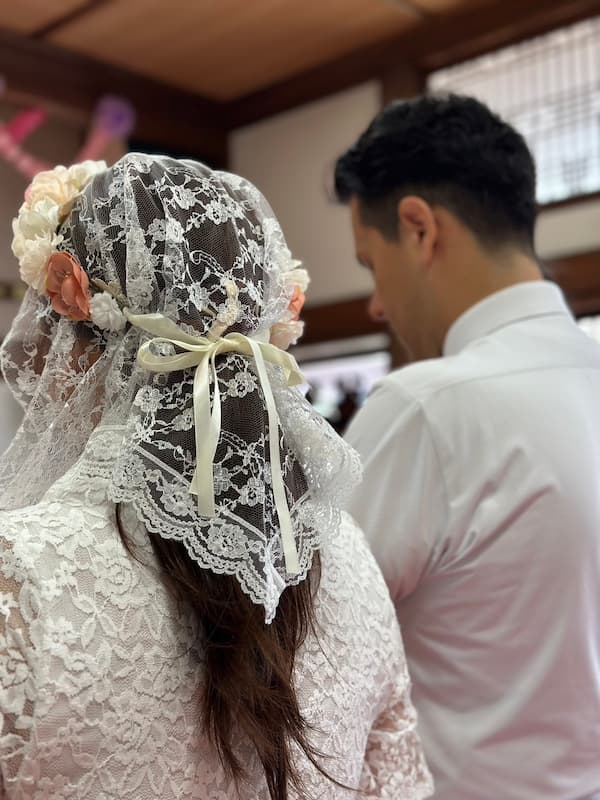 Two people getting married in Takeo Catholic Church