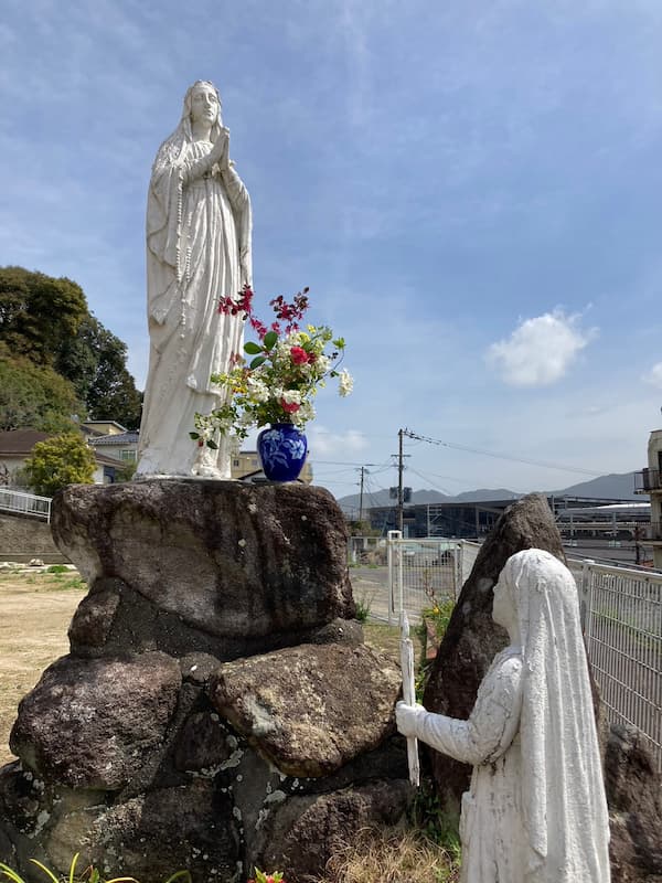 Outside picture of Statue of Mary in front of Church